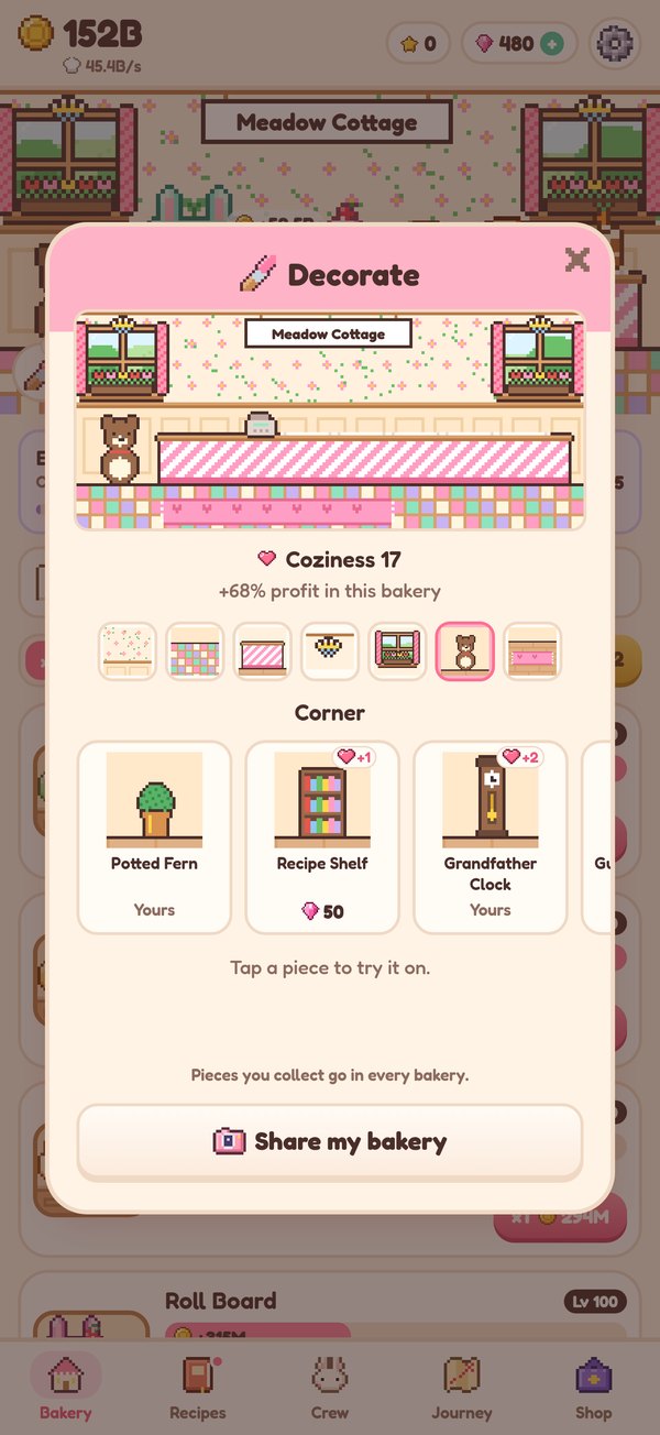 Decorating the shop: flower wallpaper, a candy-striped counter and a teddy bear in the corner